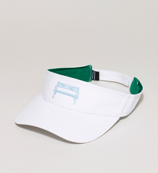 White visor with a light blue Central Park bench embroidered on