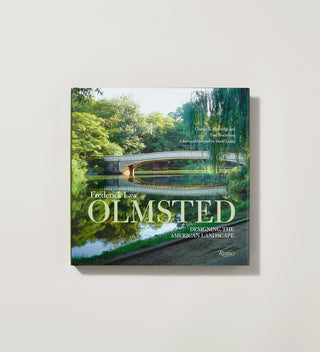 Book cover with a photograph of  abridge over water surrounded by trees and the title in light text on a grey background