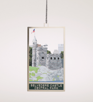 Belvedere Castle ornament with a detailed illustration of the castle and the text 'Belvedere Castle Central Park.'