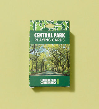 Pack of Central Park playing cards with a picture of a tree-lined path on the front.