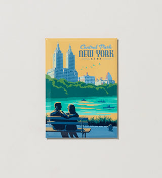 Central Park Travel magnet with two people sitting on a bench overlooking a lake