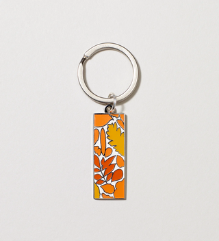 Close-up of orange leaf design keychain