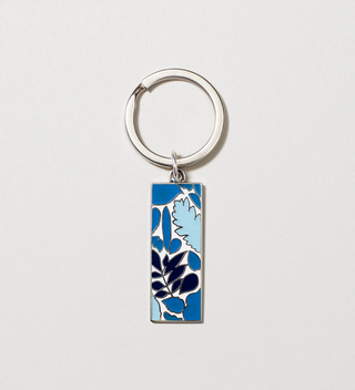 Close-up of blue leaf design keychain