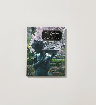 a cover of a book featuring a photograph of the Burnett Fountain Central Park's Conservatory Garden and the title in white text on a grey background.