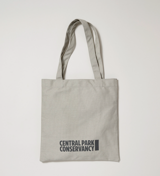 Back view of light gray tote bag with the Central Park Conservancy logo printed at the bottom