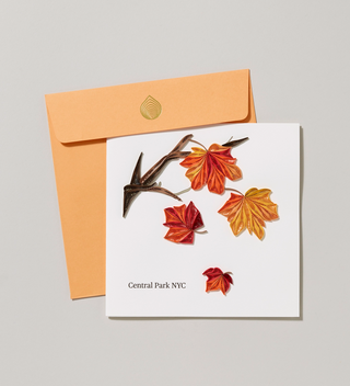 square handmade card with decorative fall leaves and Central Park NYC text