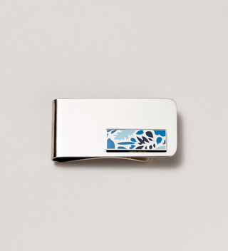 Close-up of blue leaf design money clip