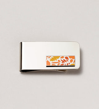 Close-up of orange leaf design money clip