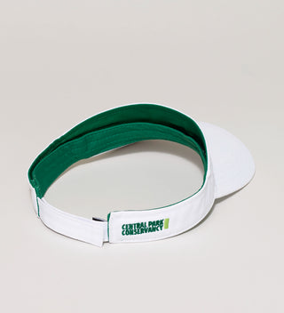 Back view of a white visor with the Central Park Conservancy logo embroidered in green