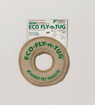 a donut shaped hemp fabric disc with text in green including ECO-FLY-n-TUG and Honest Pet Products attached to a product card