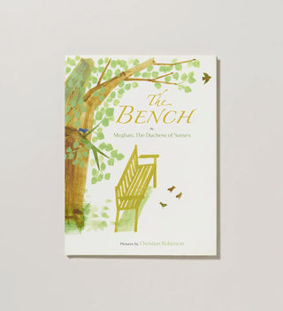 the cover of a book with a watercolor illustration of a bench next to a tree and the title 'The Bench'