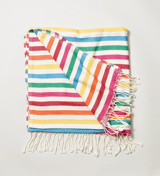 Folded rainbow striped mare peshtemal shawl from Green Petition