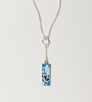 Central Park Conservancy necklace with blue leaf design