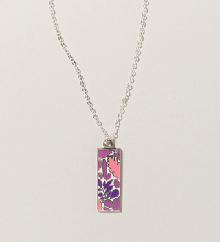 a pink and purple leaf and botanic design necklace