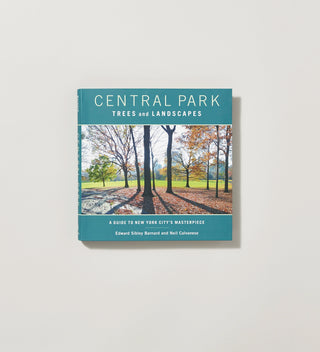 a cover of a book with an image of a grove of trees and a teal background with white text reading Central Park Trees and Landscapes