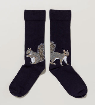 a pair of navy socks with two squirrel designs