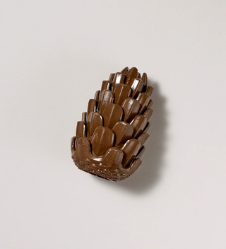 Loblolly Pinecone puzzle toy, shown from the side