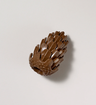 Loblolly Pinecone puzzle toy with bottom hole