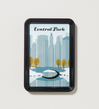 Single image of Central Park Travel Poster tray featuring a bridge and New York City skyline in the background in winter