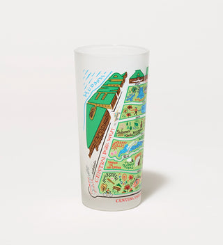 Frosted drinking glass featuring a colorful map illustration of Central Park, highlighting various landmarks.