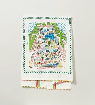 An embroidered tea towel featuring a folk inspired aerial view of Central Park