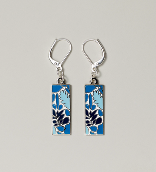 Close-up of blue leaf design pendant earrings with lever-back hooks