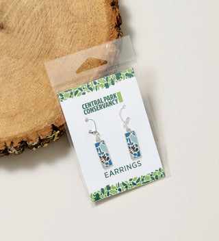 Central Park Conservancy earring set with blue leaf design pendants in packaging