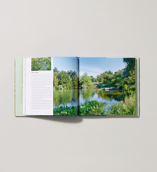 Inside spread of Hardcover book titled "Seeing Central Park: The Official Guide Updated and Expanded" by Sara Cedar Miller with pages displaying a page with a photograph of a pond surrounded by trees