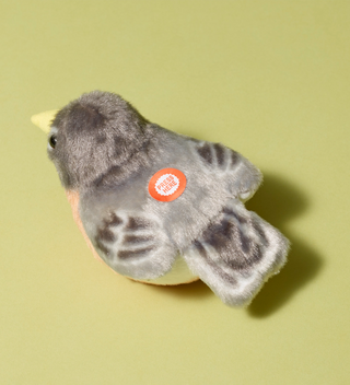 Audubon plush toy, American robin bird, featuring a button labeled 'Press Here' on its back to hear an authentic bird call from the Cornell Lab of Ornithology's wildlife recordings