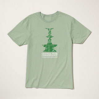 Green t-shirt with Central Park Conservancy Bethesda Fountain in greee and wordmark in antigue white on a gray background