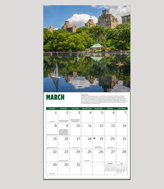 Calendar for March with a scenic view of a lake and buildings in the background