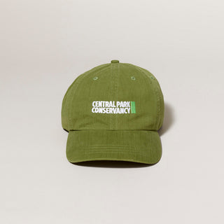 Green cap with 'Central Park Conservancy' text on a light gray background