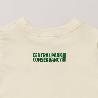 Natural shirt with 'Central Park Conservancy logo' on a light gray background