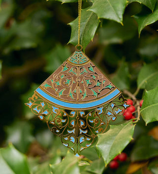 Decorative brass ornament inspired by the iconic Minton tiles in Central Park's Bethesda Terrace. All products available through Central Park Conservancy Shop.