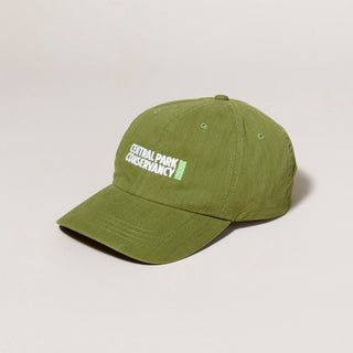 Green cap with 'Central Park Conservancy' logo on a light gray background