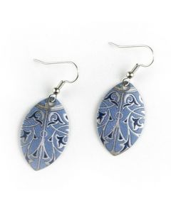 These teardrop shaped earrings, made of printed brass with applied silver gilt, were inspired by design elements of the Minton tile ceiling at Bethesda Terrace Arcade in Central Park. The ceiling is a richly decorated component of the Arcade, which was re