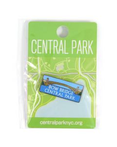 This rectangular metal and enamel pin features one of Central Park's most popular attractions—Bow Bridge. Measures 1.5x.75" and features a bright blue background.