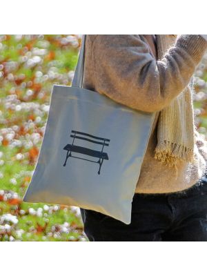 Our Central Park Bench Design tote bag is made from 12 oz. cotton and features an open interior pocket and reinforced stitching. Machine washable. Dimensions: 14 x 14.2 inches.