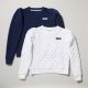 This soft-to-touch crewneck sweatshirt features an all-over diamond quilt pattern, puff sleeves and a slightly cropped fit.. Comes in White and Navy Blue, each with Central Park Conservancy logo on front,