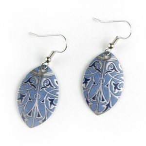 These teardrop shaped earrings, made of printed brass with applied silver gilt, were inspired by design elements of the Minton tile ceiling at Bethesda Terrace Arcade in Central Park. The ceiling is a richly decorated component of the Arcade, which was re