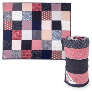The Festival Blanket, which delivers classic patchwork-quilt-chic vibes with room for everyone.
Distinctive features include:

This one-of-a-kind cotton patchwork blanket is handmade with solid denim underside. The fabric patterns and pattern placement